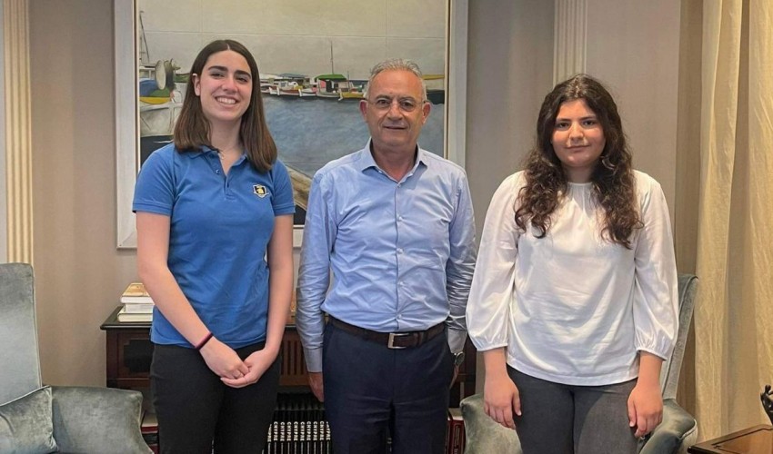 ECO School meets with politicians to discuss environmentally sustainable issues. 